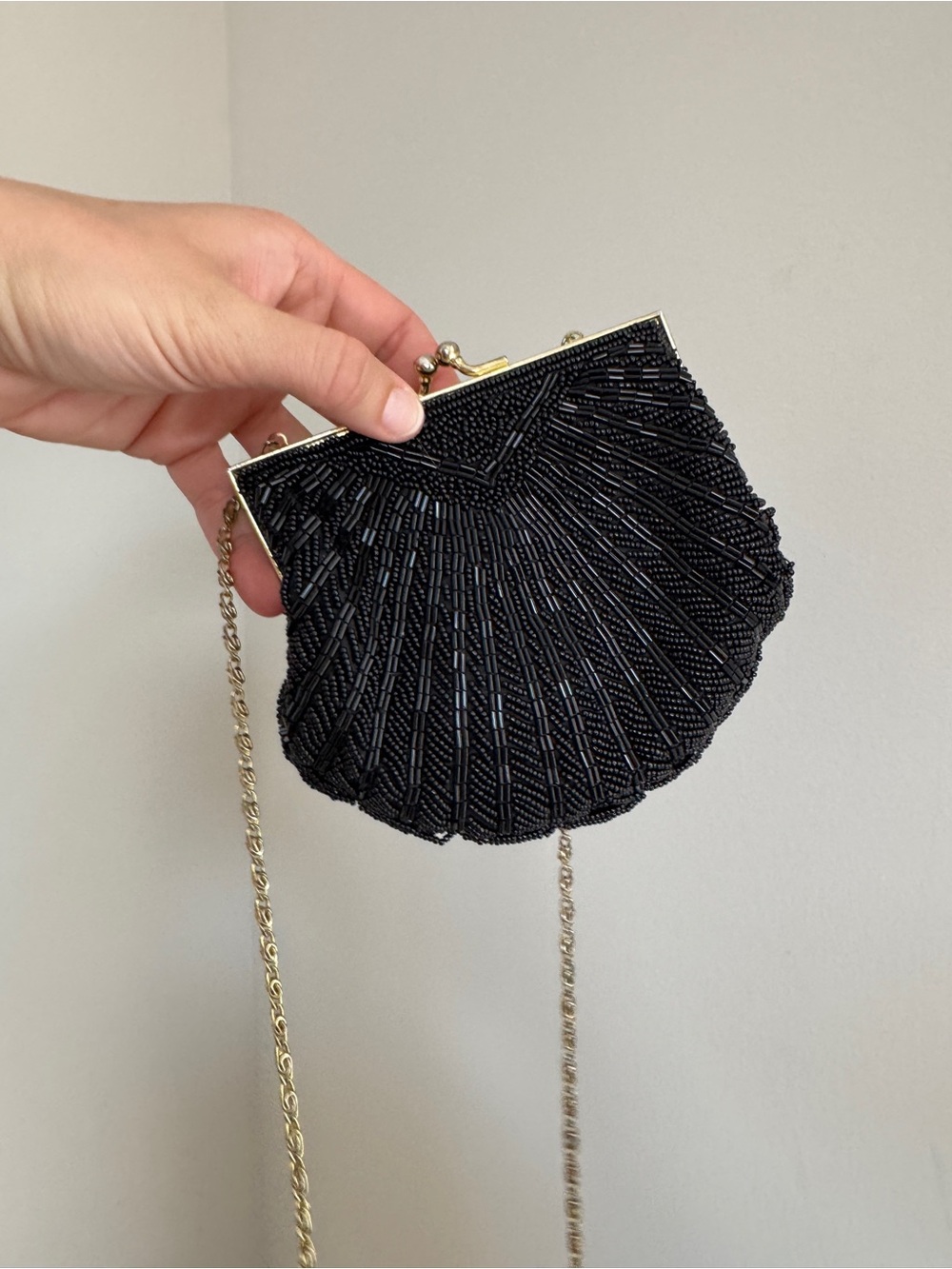 La Regale Black Beaded Shell Wristlet with Gold Chain